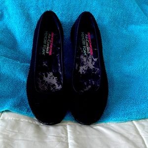 Skechers air cooled memory foam slip on shoe.